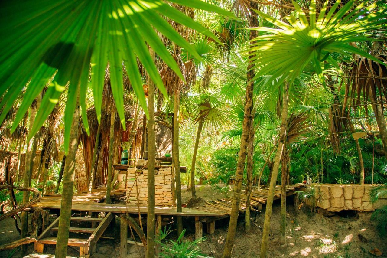 Ikal Tulum Hotel Exterior photo A traditional house in the Solomon Islands