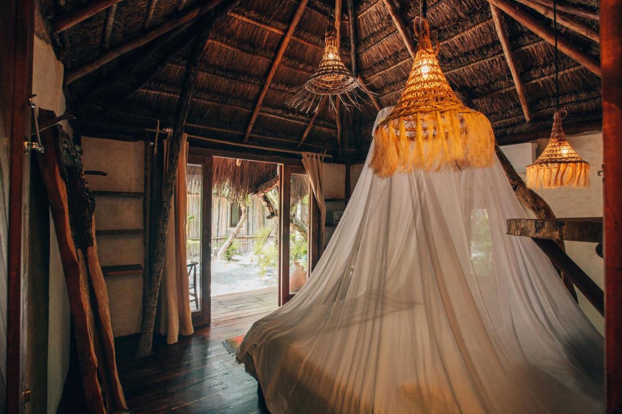 Ikal Tulum Hotel Exterior photo Interior of a bungalow at the resort