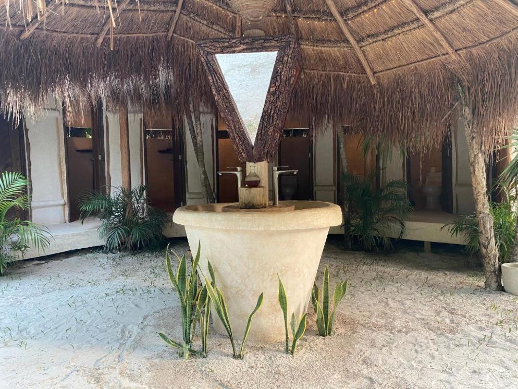 Ikal Tulum Hotel Exterior photo Fountain at the entrance of the spa